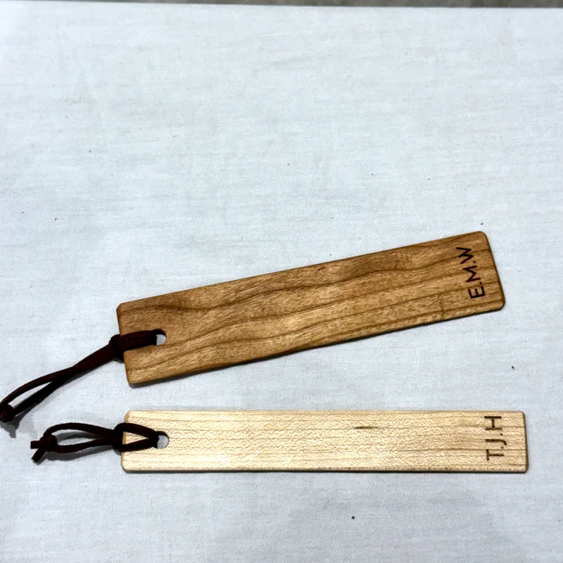 Bookmark, showing the initials on the back
