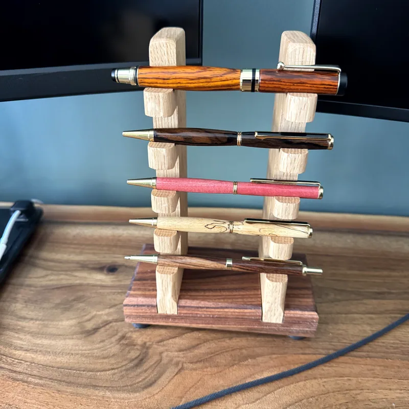 Five Pen Set with Stand, on a desk