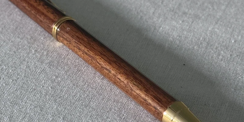 Close-up of a hand-turned pen in Bolivian Rosewood