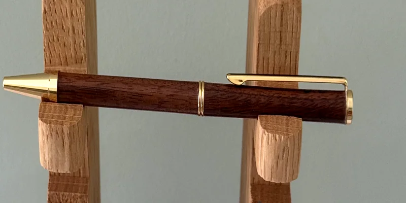 A hand-turned ballpoint pen in Bolivian Rosewood