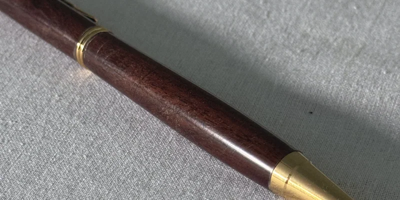 Close-up of a hand-turned pen in Leadwood