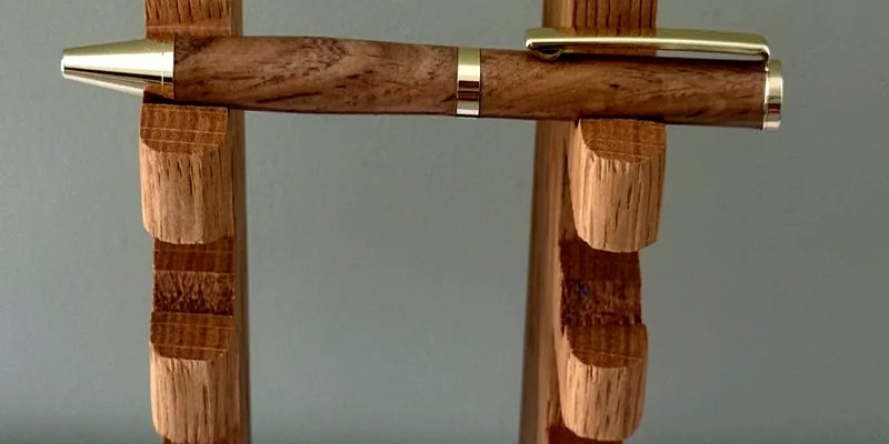 A hand-turned ballpoint pen in Oak