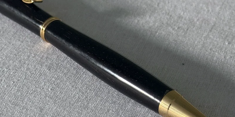 Close-up of a hand-turned pen in Pau Santo