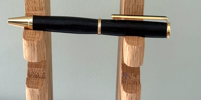 A hand-turned ballpoint pen in Pau Santo